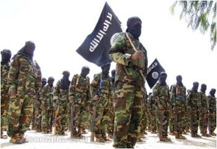 Al Shabaab fighters with their flag